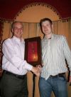 Willie Darragh receives the dreaded wooden spoon from Peter O�Neill.
