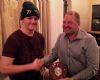 Matthew Doyle recieves the swimmers award from Michael Brunton.