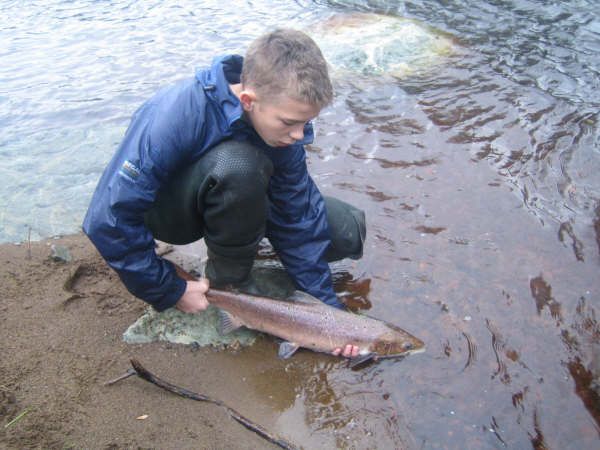 TO FIGHT ANOTHER DAY... Michael O'Kane demonstrates catch and release.