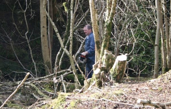 Mickey Brunton clearing along river bank